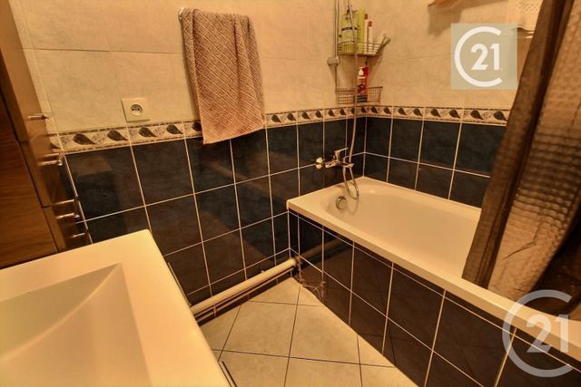 Appartement F3 à vendre - 3 pièces - 66.64 m2 - LES PAVILLONS SOUS BOIS - 93 - ILE-DE-FRANCE - Century 21 Ricard Immobilier