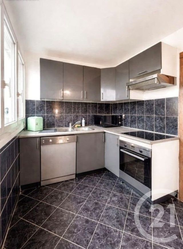 Appartement F3 à vendre - 3 pièces - 57.49 m2 - LES PAVILLONS SOUS BOIS - 93 - ILE-DE-FRANCE - Century 21 Ricard Immobilier